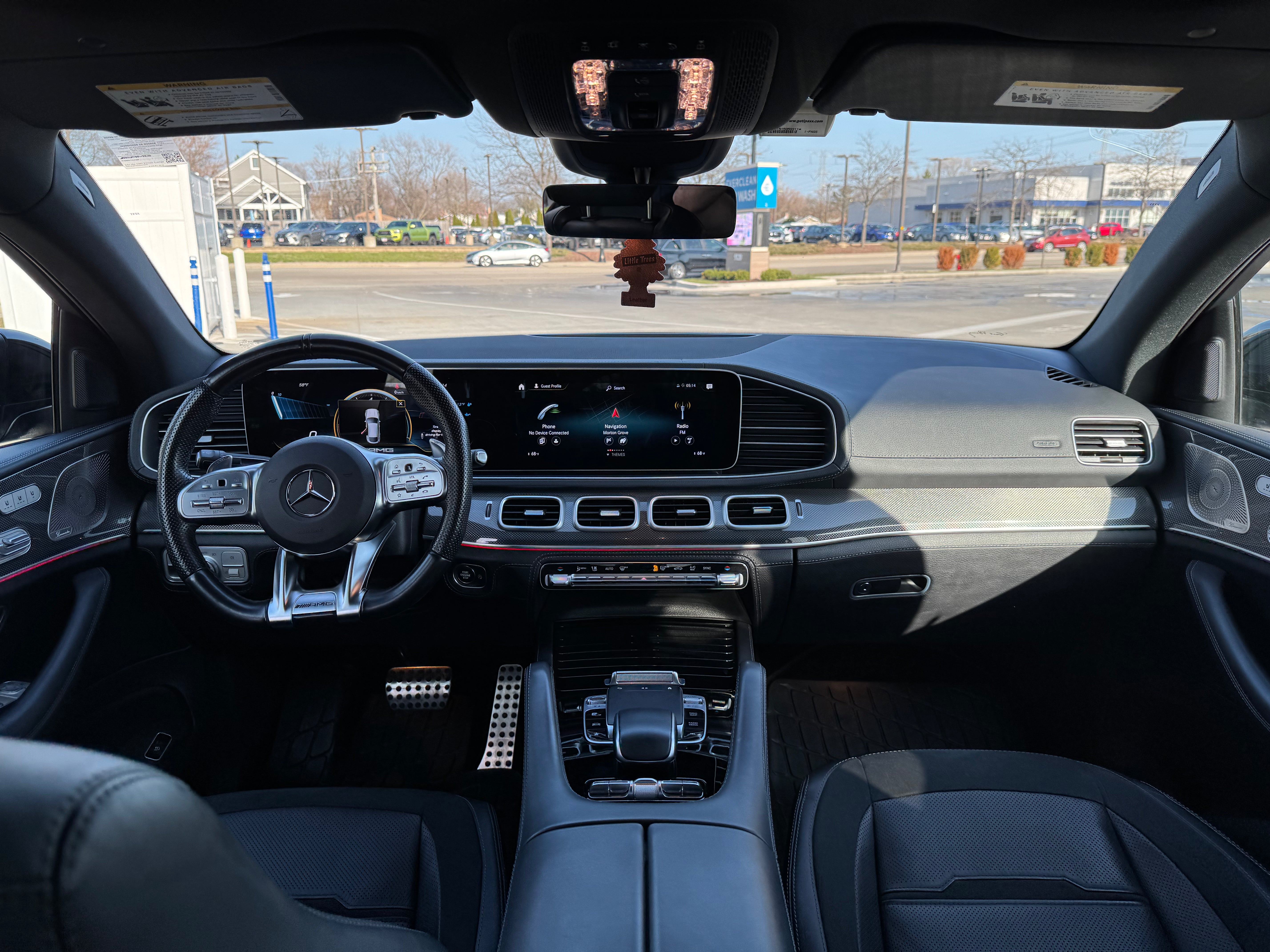 Mercedes-AMG GLE 53 interior with premium leather seats, advanced touchscreen display, and luxury detailing.